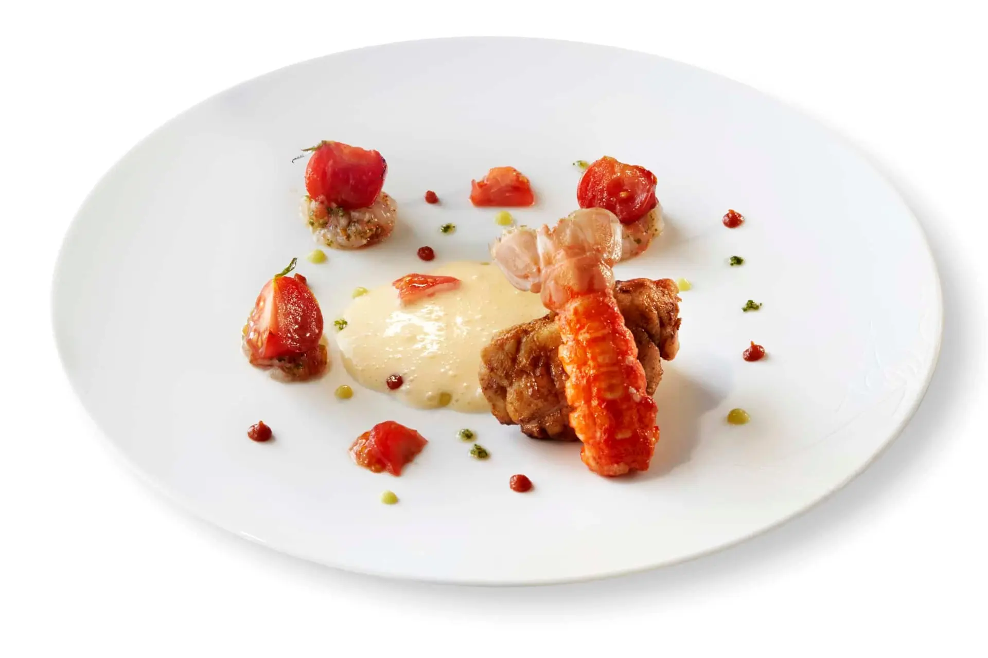 Queue de langoustine aux tomates cerises rôties