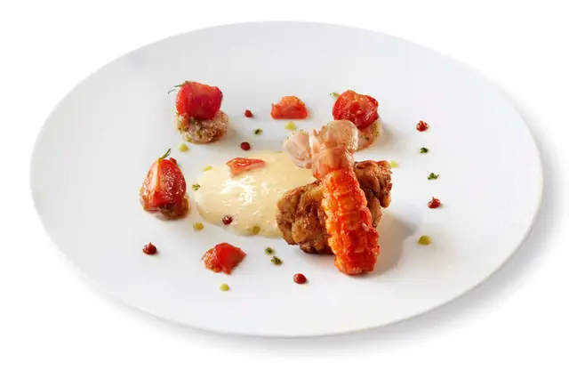 Queue de langoustine aux tomates cerises rôties