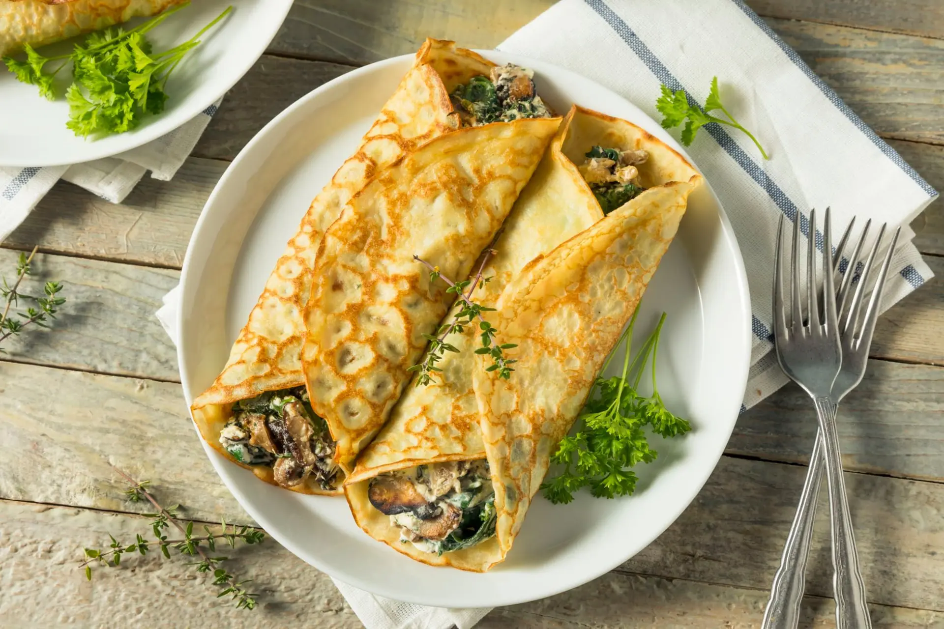 Crêpes fourrées aux champignons et épinards