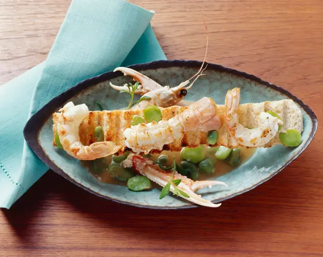 Langoustines à l'émulsion de haricots et à l'huile