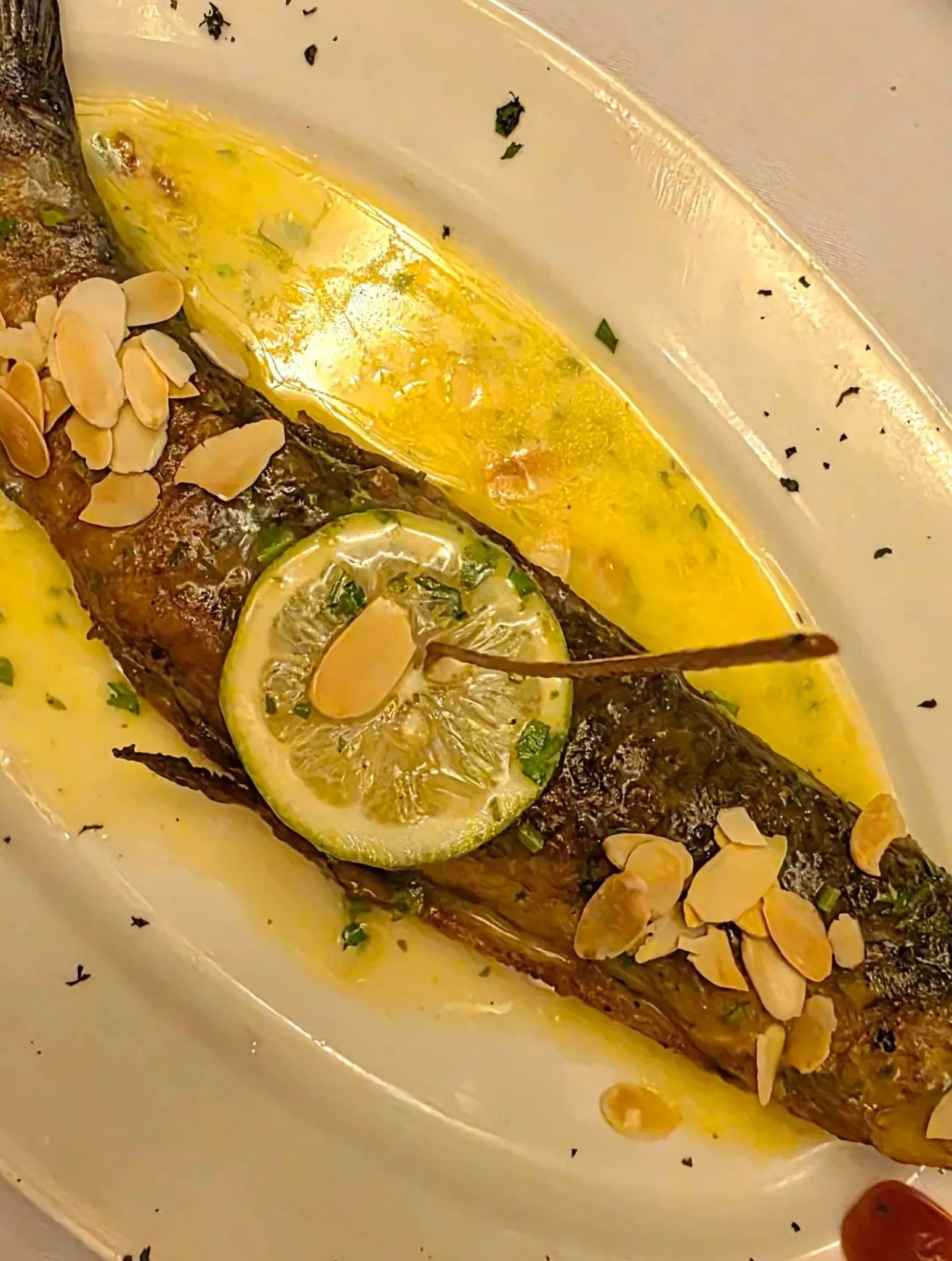 Truite saumonée aux amandes sauce citronnée