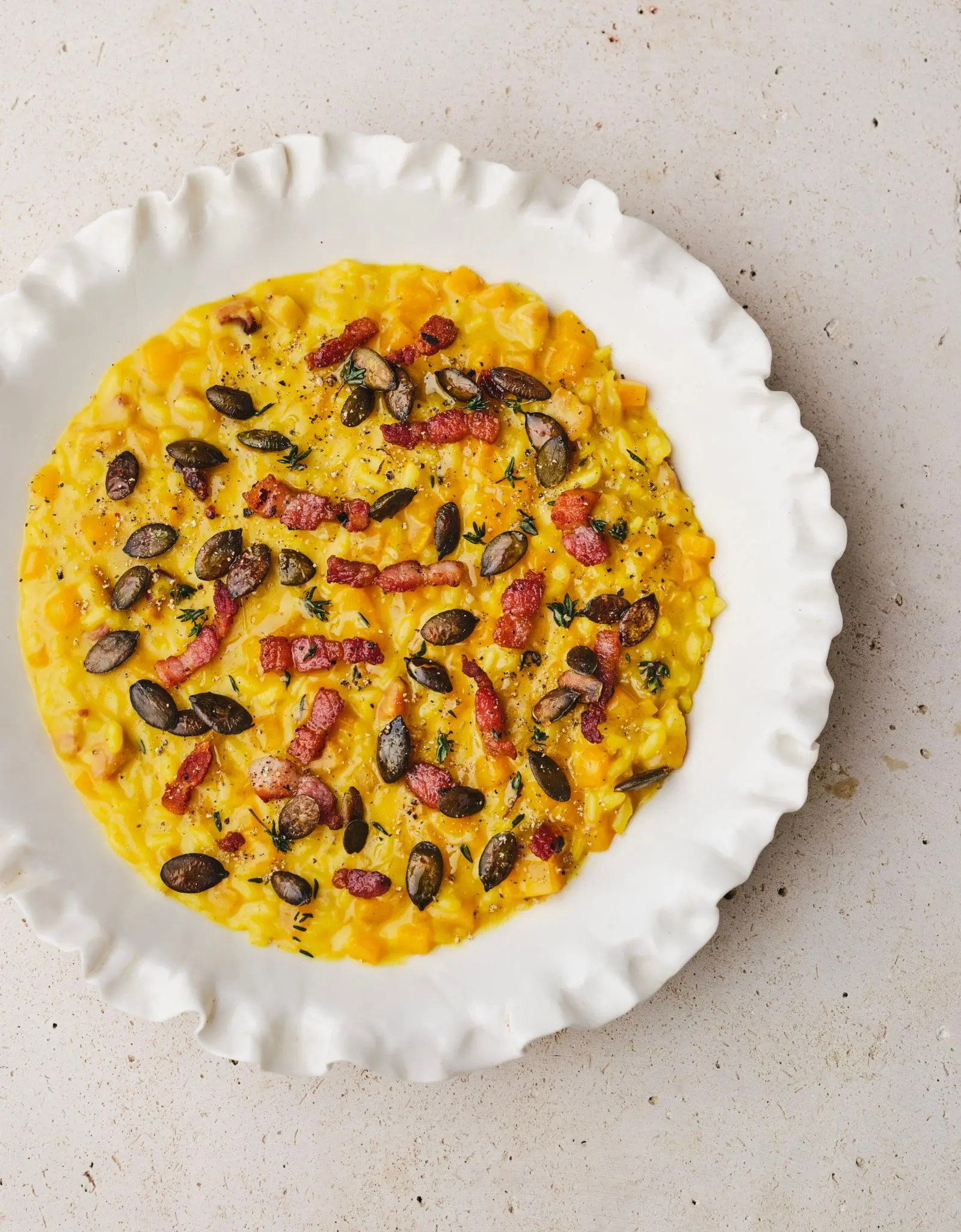 Risotto au butternut, lardons et graines de courge rôties