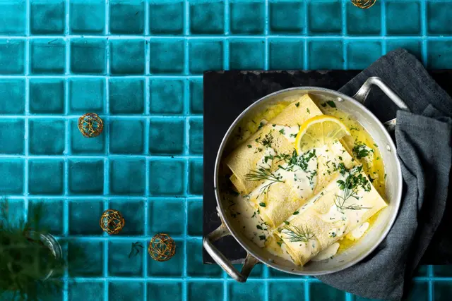 Cannellonis aux noix de Saint-Jacques, cabillaud et potimarron, sauce crémeuse au citron