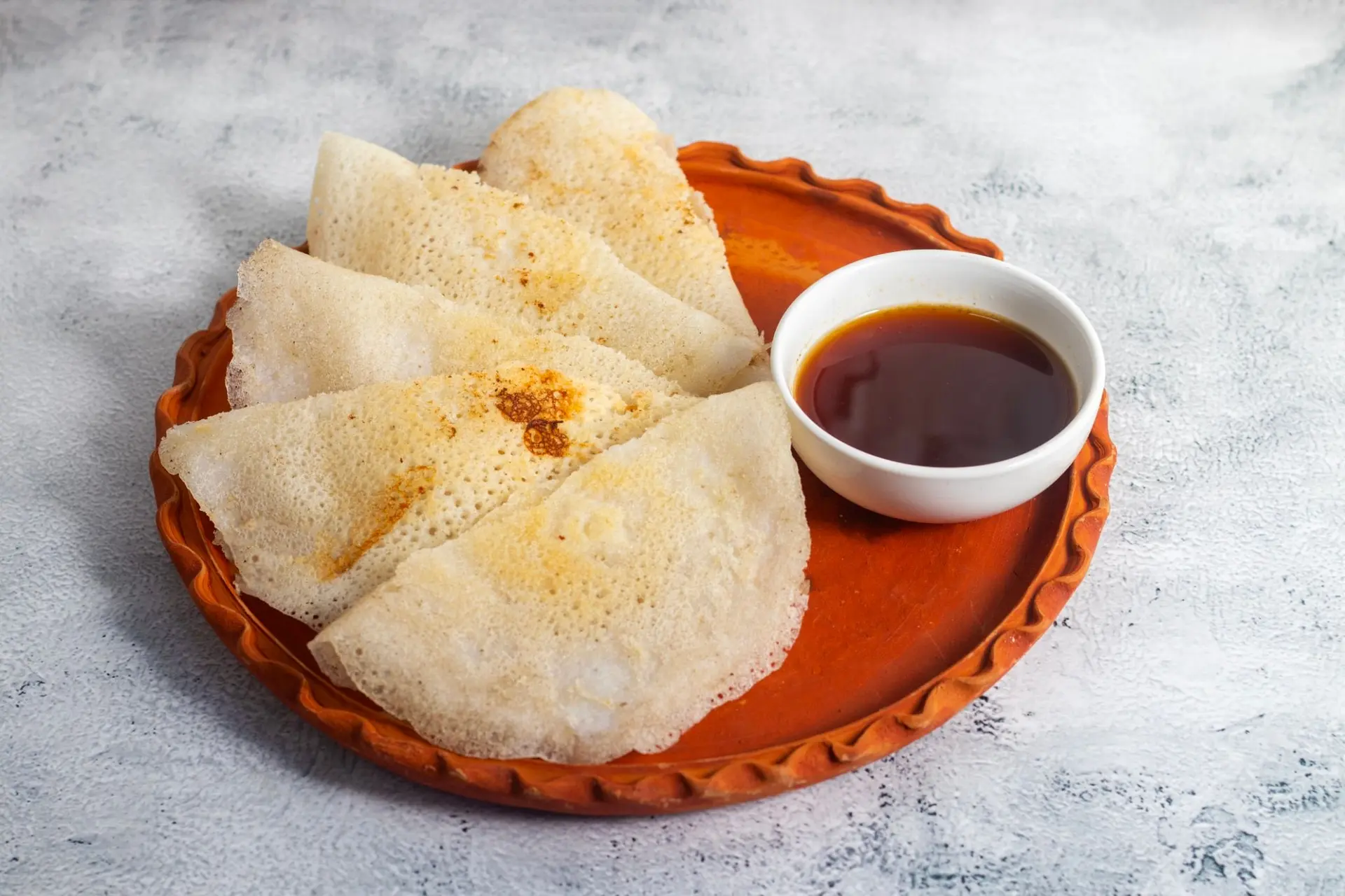 Chakuli pitha ou crêpe de riz fermentée douce