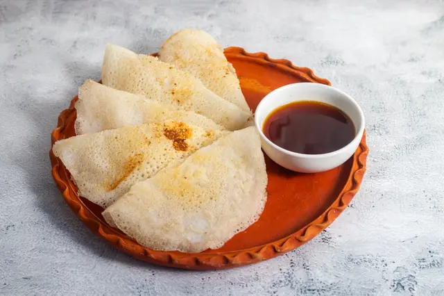 Chakuli pitha ou crêpe de riz fermentée douce