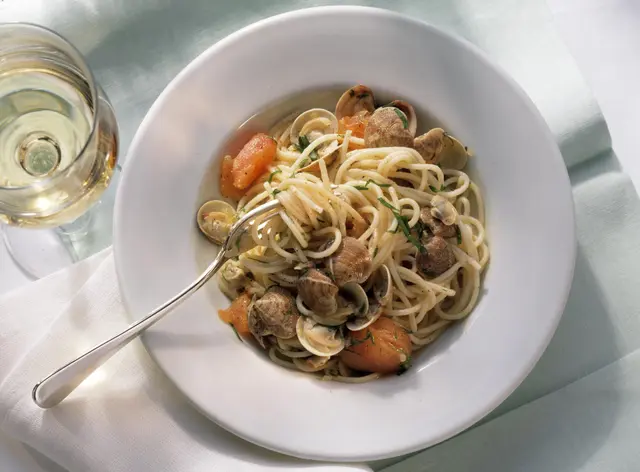 Spaghetti alle vongole et tomates fraîches